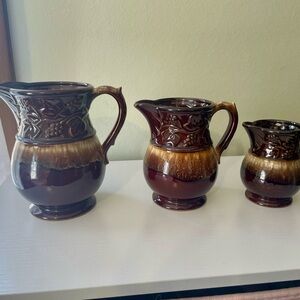 Set of Three Brown Ceramic Pitchers